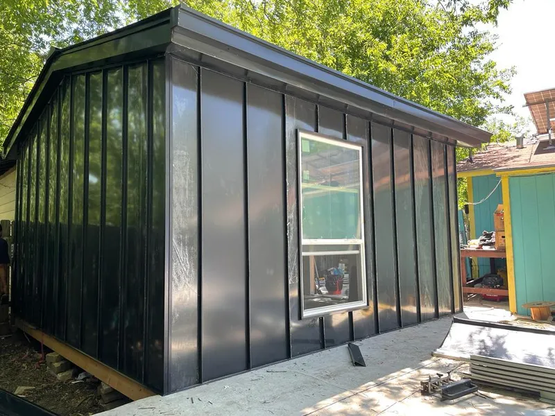 Black standing seam metal wall panels for Roof Inspection in Searcy