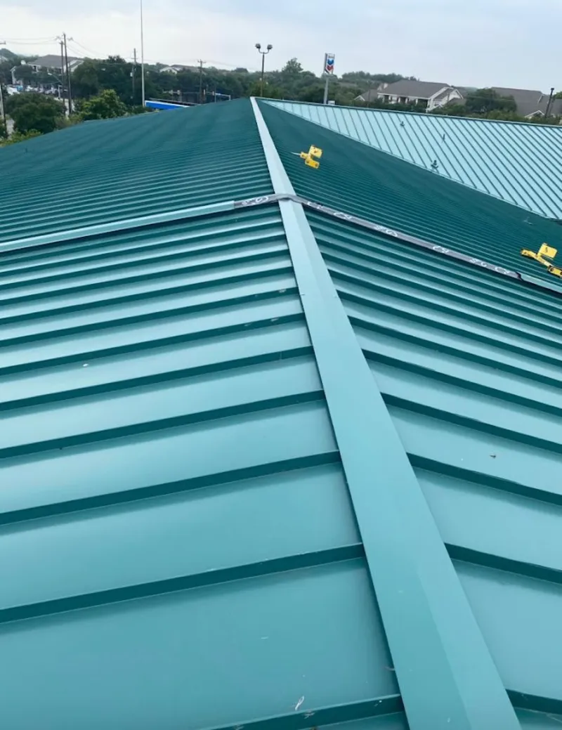 Green commercial metal roof ridge and valley for Metal Roof Repair in Searcy